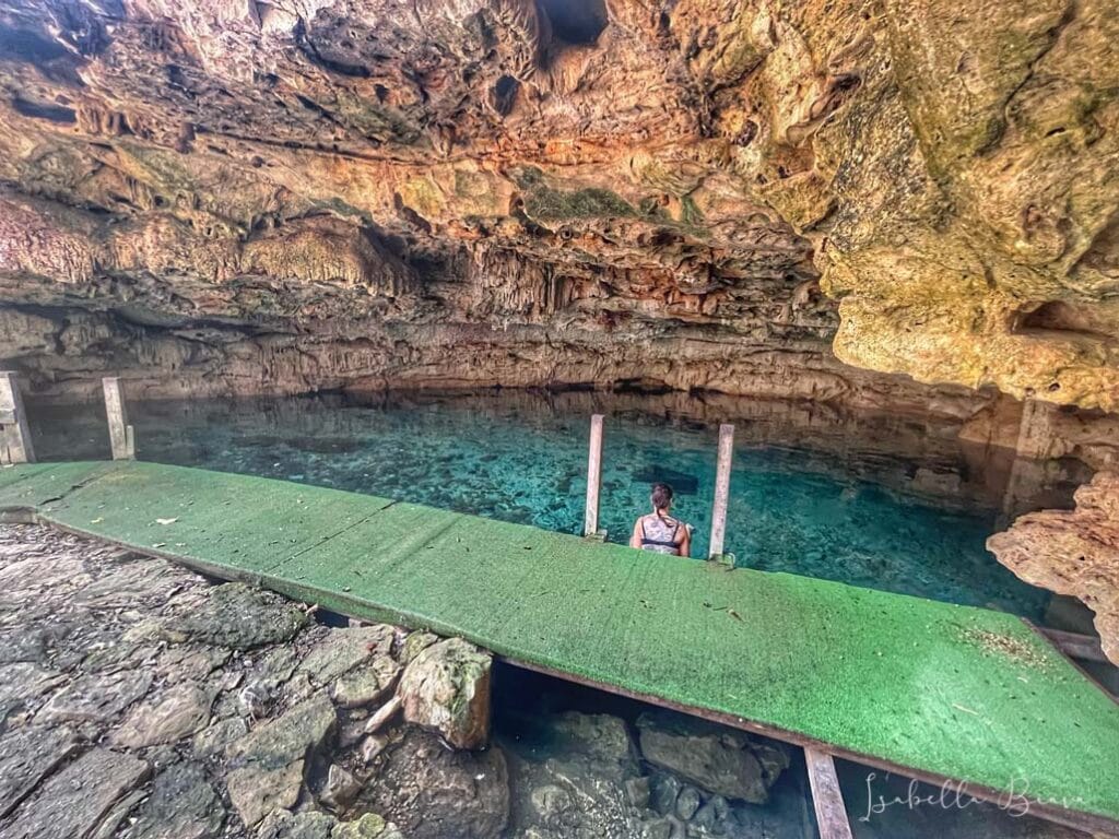 Dzonbacal cenote random girl swimming 